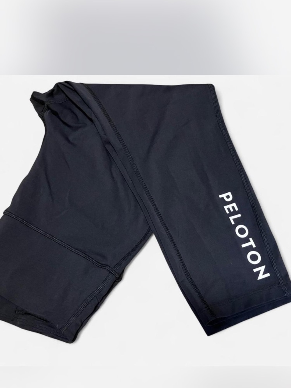 Peloton Black Cropped Leggings with White Vertical Logo